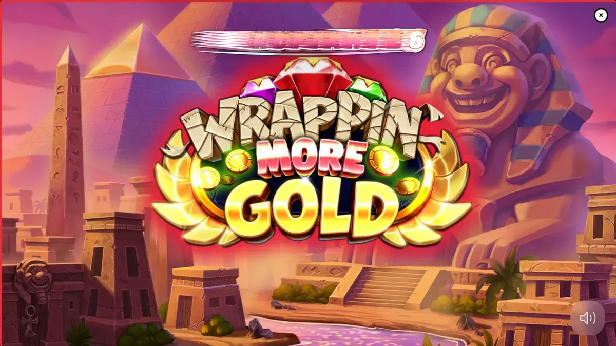 Tampilan visual slot Wrappin’ More Gold dengan mumi ramah dan latar belakang Mesir Kuno yang cerah.